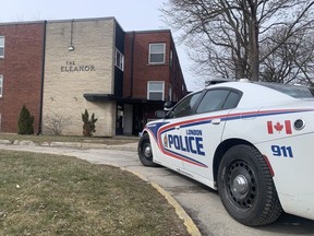 A London police cruiser is parked at the scene hours after an apartment fire at 571 Adelaide St. N. on Friday, March 24, 2023. (Dale Carruthers/The London Free Press)