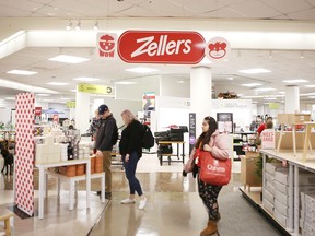 Shoppers check out the newly opened 10,000-square-foot Zellers store inside The Bay in the Cataraqui Centre in Kingston on March 23, 2023.