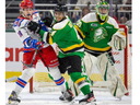 Isaiah George of the London Knights clears the crease, getting Cameron Mercer of the Kitchener Rangers out of the way for Knights goalie Brett Brochu to have a clean look at pucks during Game 2 of their second-round OHL playoff series on Friday April 14, 2023. (Mike Hensen/The London Free Press)