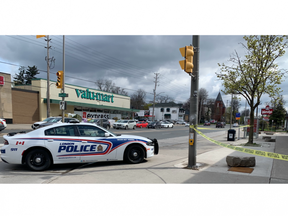 London police investigate a shooting that injured two people near the intersection of Richmond and Oxford streets on Sunday, April 23, 2023. (Norman De Bono/The London Free Press)
