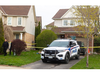 London police guard a home at 856 Redoak Ave. in northwest London on Friday, April 21, 2023. A woman died after being found there a day earlier with serious injuries. (Mike Hensen/The London Free Press)