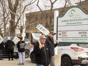 LiUNA Local 1059 members picket the Elgin County municipal building in St. Thomas on Tuesday April 4, 2023, to protest the lockout of members Meagan Whitman and Barbara Brown who are employees of a company hired by the county to clean the building. (Mike Hensen/The London Free Press)