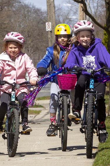 Emmy Plastino, 8, Charlotte Westbrook, 7, Emmy's twin Audrey Plastino, 8, and Amelia Westbrook, 9, are a foursome that is together “every day, all day,” according to loved ones. They were riding their bikes together in London on Friday April 7, 2023.