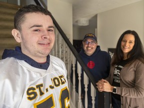 Jack Hildenbrand of Belmont, and his parents, Bob and Dione Hildenbrand, are marking 18 years since Jack's lifesaving heart transplant in 2005. Born with a  defective heart, he received a new one when he was just 36 days old. (Mike Hensen/The London Free Press)