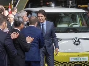 Prime Minister Justin Trudeau greets officials at a news conference on Friday, April 21, 2023, in St. Thomas where details about Volkswagen's plan to build a $7-billion electric vehicle battery plant in the city were announced. (Mike Hensen/The London Free Press)