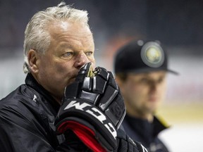 London Knights head coach Dale Hunter is a study in concentration on Tuesday, April 25, 2023, as the Knights prepare to face the Sarnia Sting in the OHL's Western Conference championship starting Friday in London.  (Mike Hensen/The London Free Press)