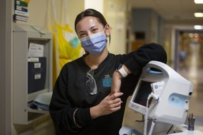 In demand.  Ashley Injic, 21, a fourth year nursing student at the University of Windsor who is an undergraduate nursing employee, is pictured in the oncology department at Windsor Regional Hospital's Met campus on Monday, April 10, 2023. (DAX MELMER/Postmedia Network)
