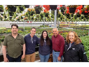 Siblings Tom, Will and Bridget Heeman, their dad Rudy and aunt Rita Heeman get together to mark the 60th anniversary of their berry farm and garden centre on Nissouri Road. (Mike Hensen/The London Free Press)