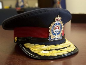 London police chief's hat sits on a desk at police headquarters in London. The police services board says it will name someone to wear the hat, and a new deputy chief, by month's end. (Free Press files)