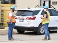 Ministry of Labour officials are shown investigating the fatal workplace fall of a person at a job site on Centre Street in Chatham on July 19, 2021. Mark Malone/Chatham Daily News