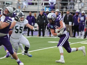 Western Mustangs running back Edouard Wanadi carries the ball against St. Francis Xavier during the Mitchell Bowl on Nov. 27, 2021. DALE CARRUTHERS/THE LONDON FREE PRESS