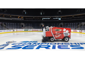Eric Turrell floods the new OHL Championship Series decal into the ice at Budweiser Gardens in London on Wednesday, May 10, 2023,  
ahead of Thursday's opening game of the series pitting the London Knights against the Peterborough Petes. (Mike Hensen/The London Free Press)
