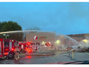 London firefighters battle a blaze at United Supermarket on Adelaide Street in London on Friday, May 12, 2023. (London fire department)
