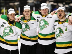 London Knights players celebrate after beating the Sarnia Sting in Game 6 of the OHL's Western Conference final at Progressive Auto Sales Arena in Sarnia to win the series on Sunday, May 7, 2023. Mark Malone/Chatham Daily News/Postmedia Network