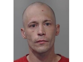 James Alexander Brown, 39, of St. Thomas is charged with attempted murder and several gun-related offences after a 24-year-old woman suffered critical injuries in a shooting Tuesday afternoon. (Twitter/St. Thomas police)