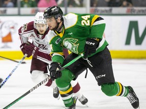 Logan Mailloux of the London Knights is chased by Brennan Othmann of the Peterborough Petes during Game 1 of the OHL finals at Budweiser Gardens in London on Thursday, May 11, 2023. (Derek Ruttan/The London Free Press)
