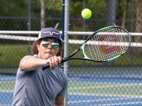 Domonic Wiebe plays tennis with his friend Chase Toews in St. Marys on Sunday May 21, 2023. Photo by Derek Ruttan/The London Free Press