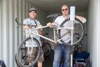Shawn Mitchell, left, and AJ McCallum are fixing up bicycles at St Aidan's Anglican Church in London.  The church's Bikes for Migrants campaign donates bikes to local migrant workers.  Photo taken Tuesday, May 23, 2023. (Derek Ruttan/The London Free Press)
