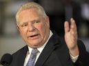 Premier Doug Ford, in London Wednesday to unveil two auto-sector training and job placement programs, is defending his government's move to put more money into a Windsor electric-vehicle battery plant.  (Mike Hensen/The London Free Press