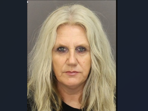 An arrest warrant has been issued for Anne Marie Hunt, 56, on charges of dangerous driving, failing to stop for police and failing to comply with an undertaking. (London police photo)