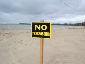 The appearance of "no trespassing" signs on the Port Dover beach caused a stir within and outside the lakeside town. The beach is almost entirely privately owned by a cottage park and a local restaurateur.(J.P. ANTONACCI/Local Journalism Initiative)