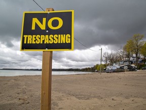 No Trespassing signs went up on the beach at Port Dover, Ontario late in April 2023.