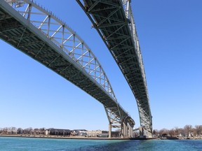 Blue Water Bridge's twin spans link Sarnia's neighbour, Point Edward, with Port Huron, Mich., over the St. Clair River.  (Postmedia file photo)