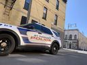 A St. Thomas police cruiser remained parked outside an apartment building at Talbot and East streets on Wednesday following a shooting on Tuesday.  (DALE CARRUTHERS/The London Free Press)
