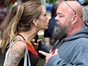 A demonstrator and a counter-protester go face-to-face at a Pride event in London's Wortley Village on Saturday June 10, 2023. Dale Carruthers/The London Free Press