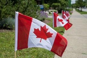 Horizon Place Retirement Residence has 86 flags lining the property at the corner of Beaverbrook Avenue and Horizon Drive in London, Ontario on Wednesday June 28, 2023. (Derek Ruttan/London Free Press)