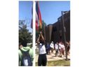 A person is shown pulling down a rainbow Pride flag outside Sir Frederick Banting secondary school in this screengrab taken from a video of the incident, which happened on Tuesday June 6, 2023.
