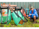 Luis Reyes, who runs the London Food Bank's gardens, is shown with wheelbarrows that had their wheels removed in a damaging break-in. Photo taken on Monday July 3, 2023. (Mike Hensen/The London Free Press)