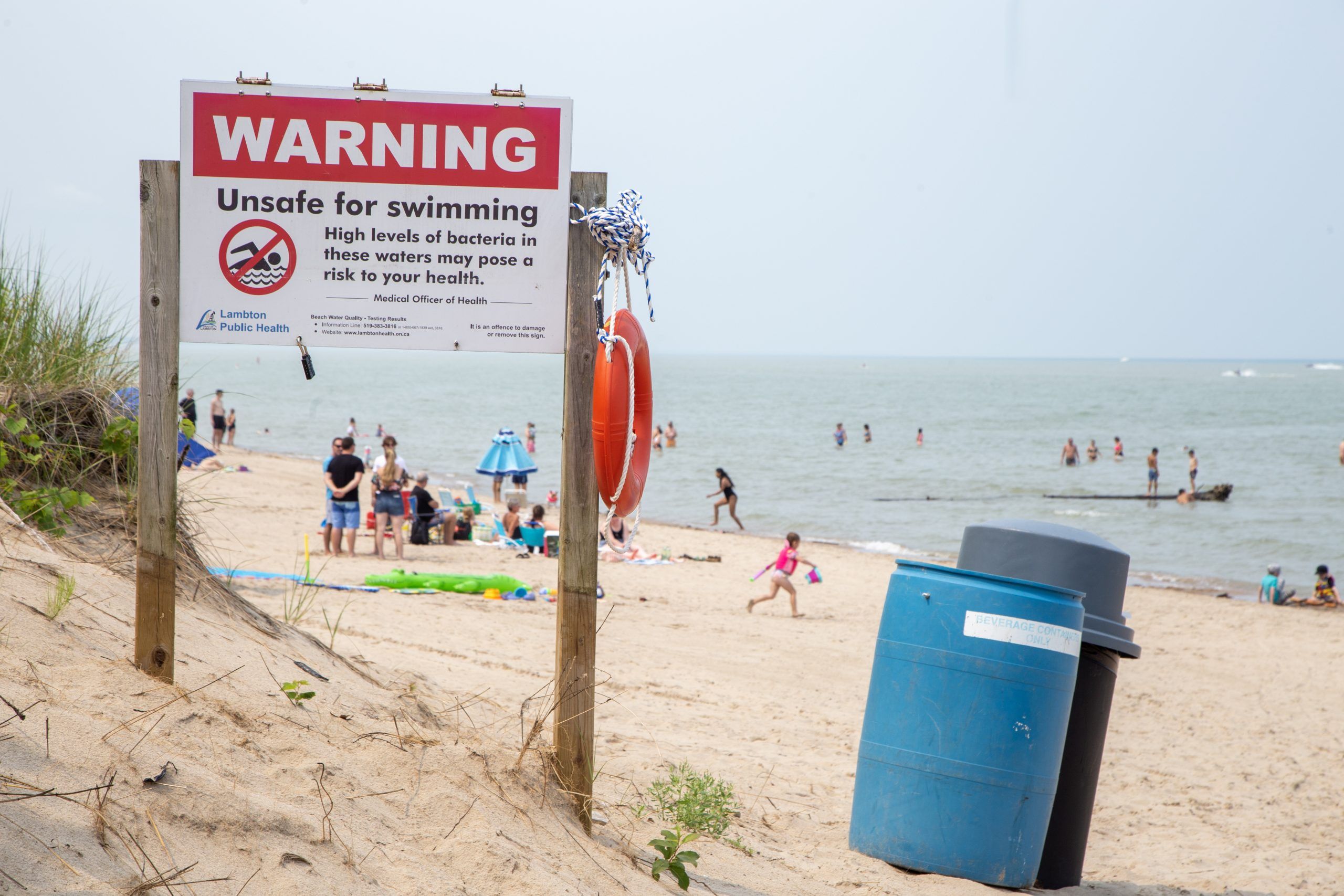 Public health officials issued a warning Sunday about the water quality at a popular Southwestern Ontario beach following a week of heavy rains in the region