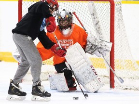 Declan Glenn faces a shooter at the Joseph Raaymakers Goalie School at Thames Campus Arena in Chatham on Thursday. (Mark Malone/Chatham Daily News)