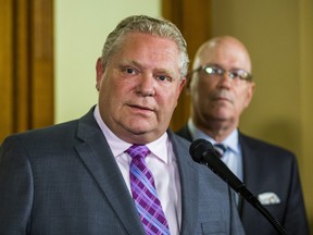Ontario Premier Doug Ford and Minister of Municipal Affairs and Housing Steve Clark, address media outside of the Premier's office at Queen's Park in Toronto, Ont. on Monday, May 27, 2019.