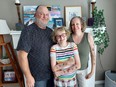 Chord Jaques, 11, and his parents Ben and Tara Jaques. PHOTO Ellwood Shreve/Postmedia