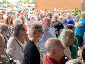 Roughly 100 supporters of Chatham-Kent Coun. Rhonda Jubenville gather outside a council meeting in Chatham where her punishment for breaching council's code of conduct was to be determined. Photo taken on Monday Aug. 14, 2023. Ellwood Shreve/Chatham Daily News