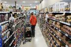 People shop inside a Metro grocery store in Toronto, Tuesday, July 18, 2023.