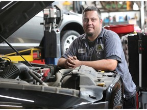 'Tough finding people.' Justin Lapointe, owner of Justin's Auto Repair in Windsor, is shown at his shop on Monday, Aug. 14, 2023.