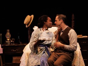 Antonette Rudder as Julia Augustine and Cyrus Lane as Herman in the Stratford Festival production of the Wedding Band. (David Hou/Stratford Festival)
