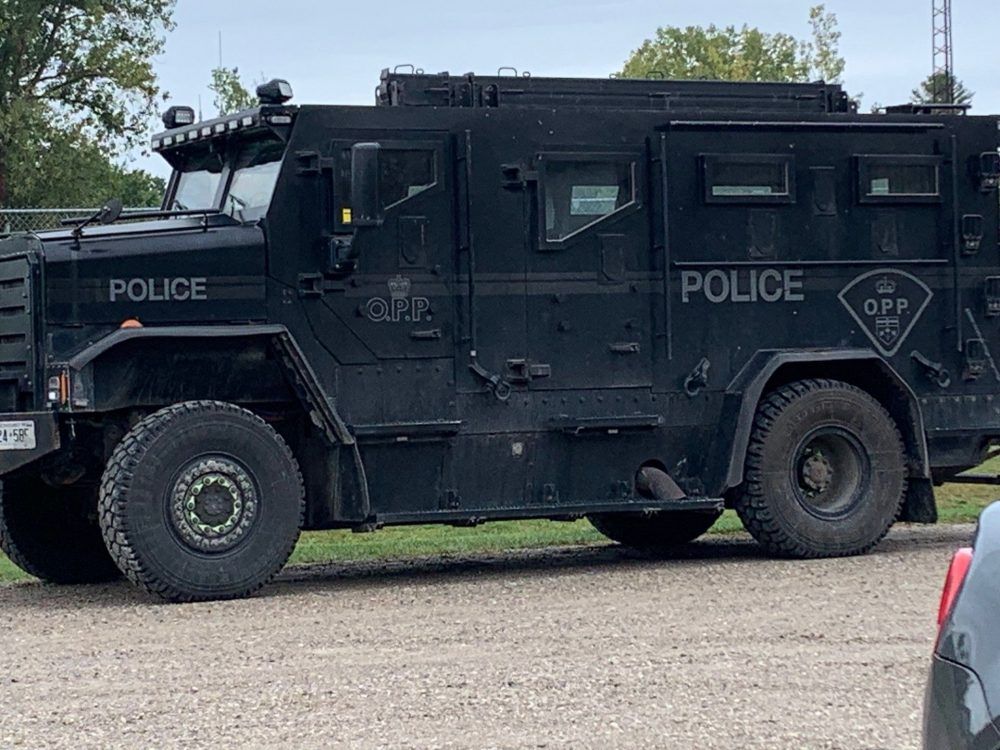 An armoured OPP vehicle sits at the Port Burwell fire hall for what police at the scene called 