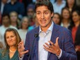 As Finance Minister Chrystia Freeland looks on, Prime Minister Justin Trudeau announces measures to spur the building of rental apartments and ease the sting of inflation at the end of a federal Liberal caucus meeting at RBC Place in London on Thursday, Sept. 14, 2023. (Mike Hensen/The London Free Press)