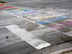 Black paint and diesel fuel were poured on the rainbow crosswalk in Tillsonburg on the weekend of Sept. 3, 2023 .