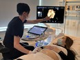 An LHSC sonographer points out the baby's face