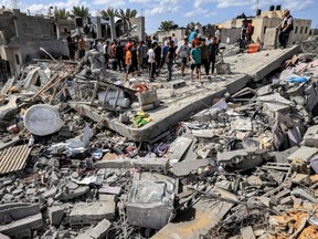 destroyed building following Israeli bombardment