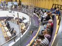 Spectators fill the public gallery in city council chambers at London city hall while city councillors debate a recommendation to open the city's first homeless hubs on Thursday Oct. 5, 2023. (Derek Ruttan/The London Free Press)