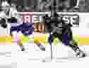 London Knights forward Denver Barkey skates with the puck as he's tracked by Kaden Pitre of the Flint Firebirds at Budweiser Gardens in London on Friday, Nov. 17, 2023. (Derek Ruttan/The London Free Press)
