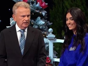 Pat Sajak and contestant Gishma Tabari on a recent episode of Wheel of Fortune.