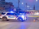 London police closed all lanes of York Street between William Street and Adelaide Street while they investigate a serious crash involving a police cruiser and a cyclist on Thursday, Dec. 7, 2023. (Derek Ruttan/London Free Press)