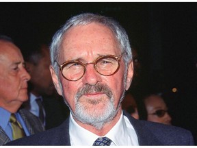 Director Norman Jewison arrives for the premiere of "The Hurricane" in Los Angeles, California, on December 14, 1999. Norman Jewison, the Oscar-nominated director of "In the Heat of the Night" and "Moonstruck" has died at the age of 97, his publicist said January 22. The Canadian-born Jewison worked with some of Hollywood's biggest stars including Steve McQueen, Denzel Washington, Sidney Poitier and singer Cher. Over an eclectic career he hopped among genres, helming musicals, comedies and romances, as well as films that tackle weighty social issues.